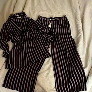Max studio suit. Black with red stripes. Size M fits large